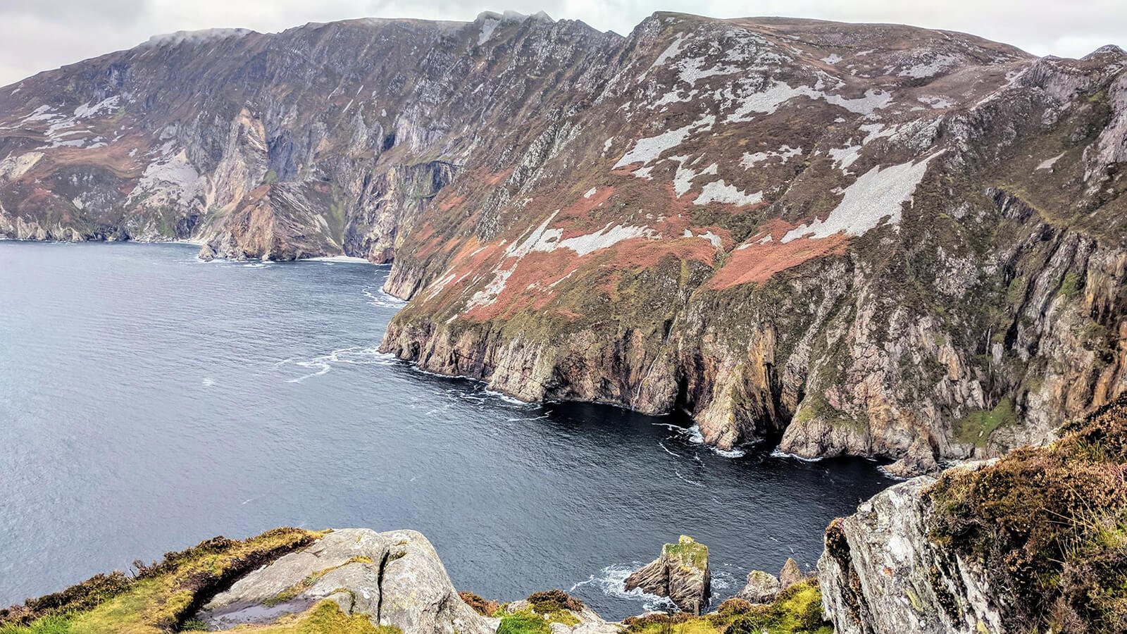 A scenic view of the Slieve League cliffs and the Atlantic Ocean
