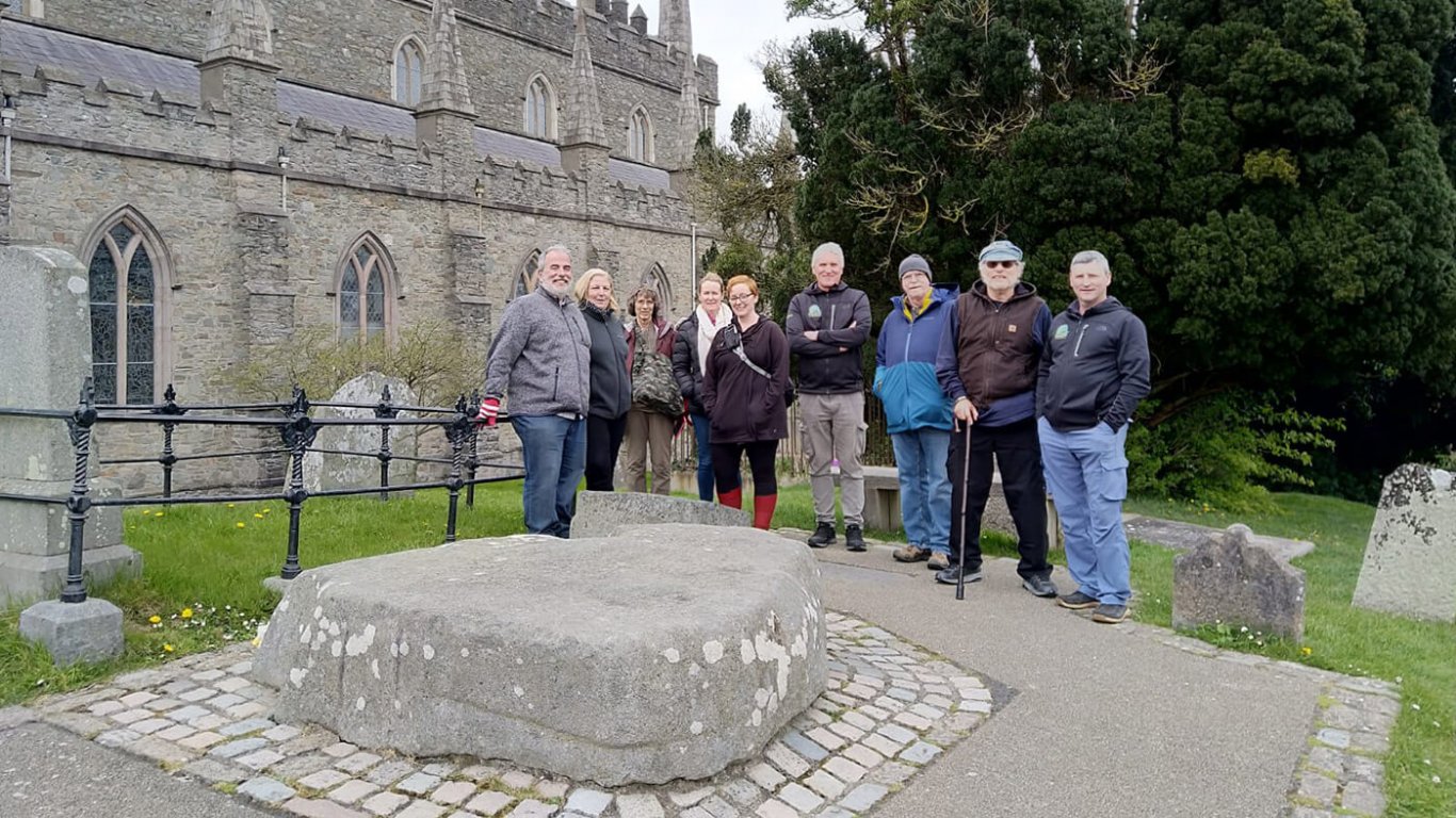 A driftwood group visiting the grave of St Patrick