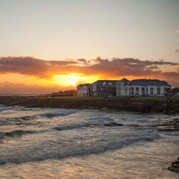 A view of the armada in spanish point during the sunset with a view of the sea