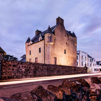 A view of Ballygally castle at dusk