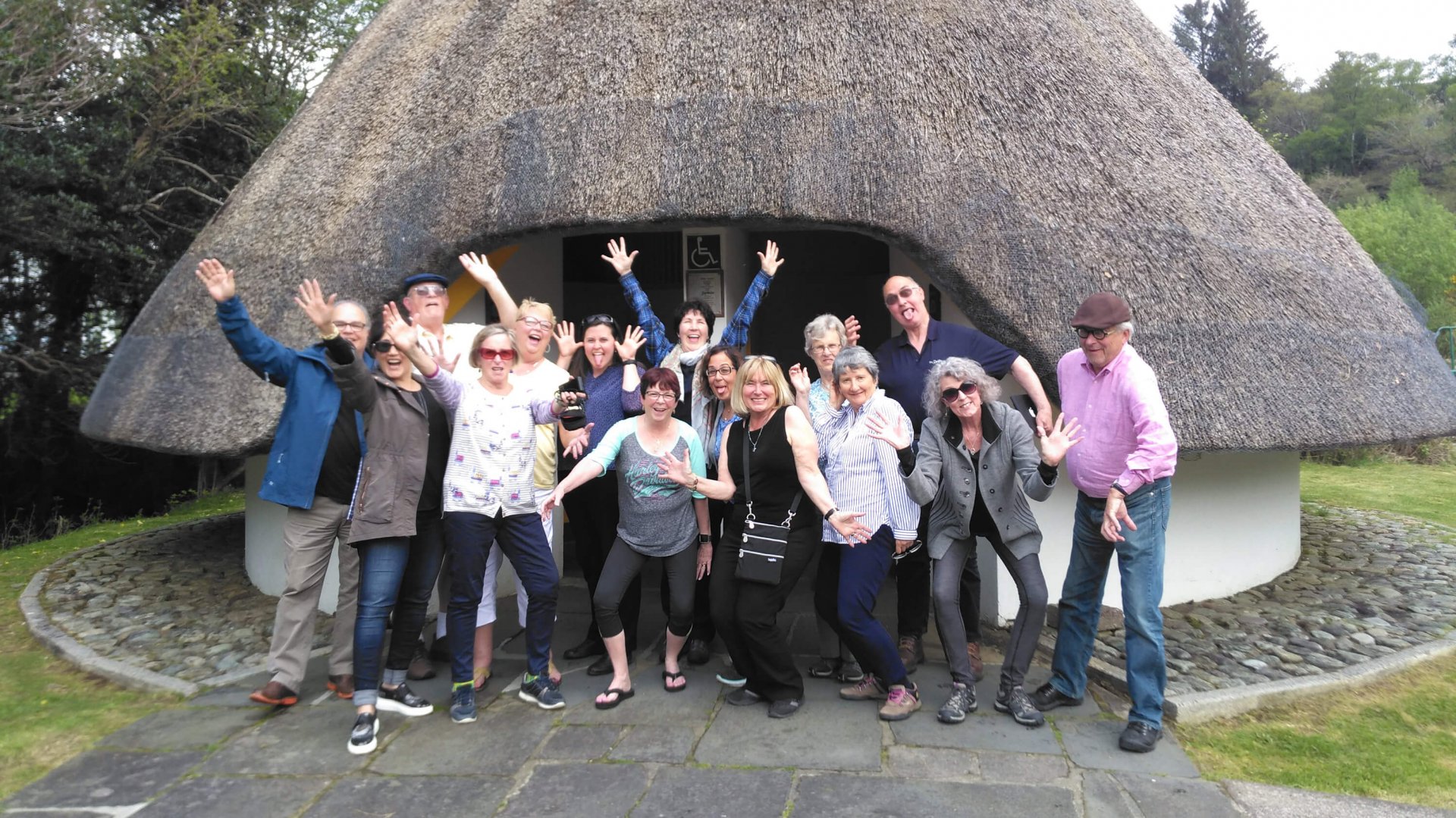 A group of excited Vagabond guests at Ireland's finest toilets in Gougane Barra Forest Park